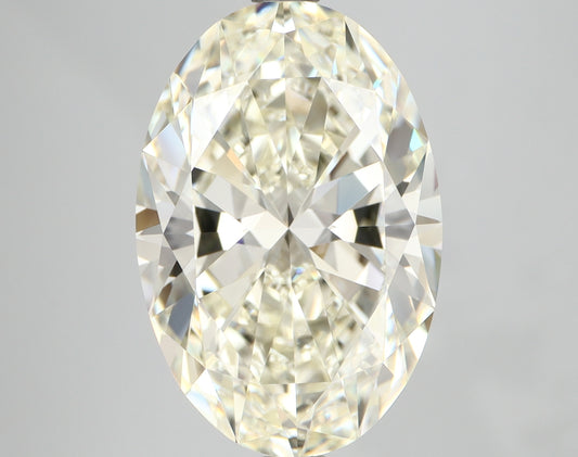 gia certified oval cut natural diamond l m color light warm tone vvs vs