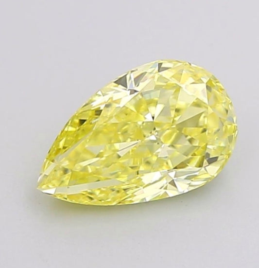 igi certified fancy vivid yellow pear cut lab grown diamond